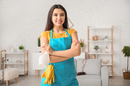 Young woman with spray bott...