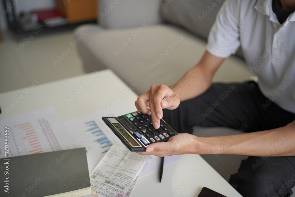 Fototapeta premium Man planning finance for insurance, loan real estate or property.