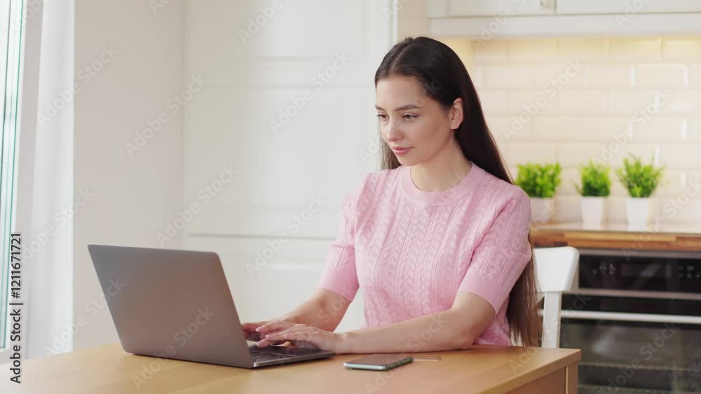 Young attractive woman shopping online with a laptop computer using a credit card. e-commerce, business concept. Freelance, remote work Young attractive woman shopping online with a laptop computer using a credit card. e-commerce, business concept. Freelance, remote work