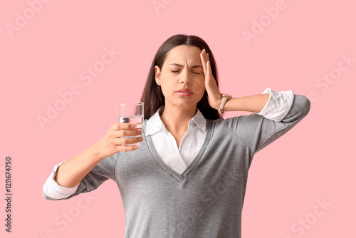 Young woman with glass of w...