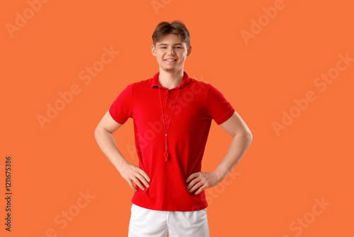 Male lifeguard on orange ba...