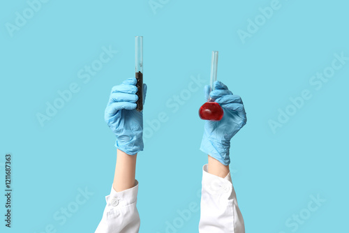 Scientist's hands holding t...