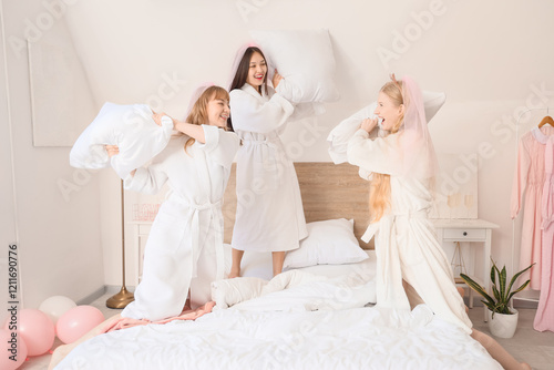 Joyful young women in robes...