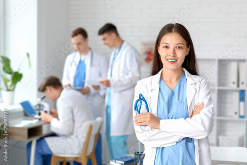 Female Asian doctor with st...