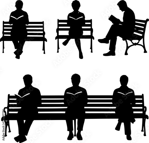 Silhouettes of people sitting on a park bench, reading.