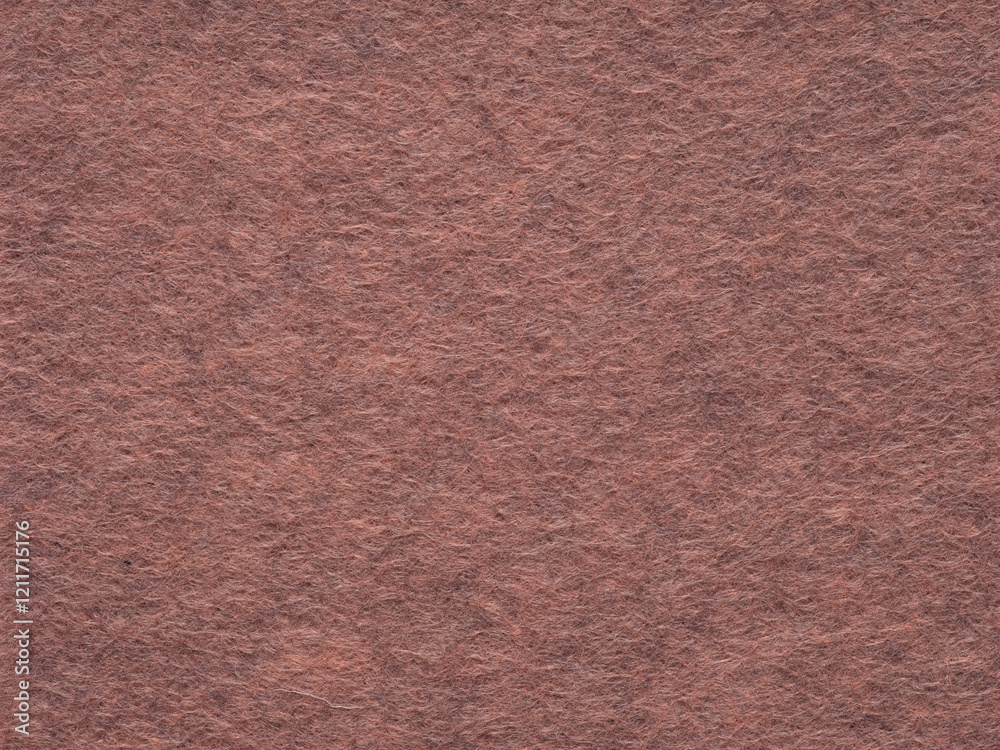 Fototapeta premium Rustic rose felt texture, invoking a warm, nostalgic sentiment with its rich, earthy tones
