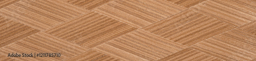 Elegant crisscrossing wooden veneer with a smooth finish and natural tones photo