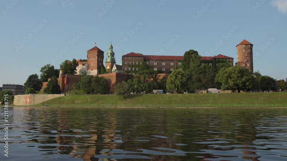 Exploring the rich history of Wawel Castle along the Vistula River in Krakow during a sunny afternoon Exploring the rich history of Wawel Castle along the Vistula River in Krakow during a sunny afternoon