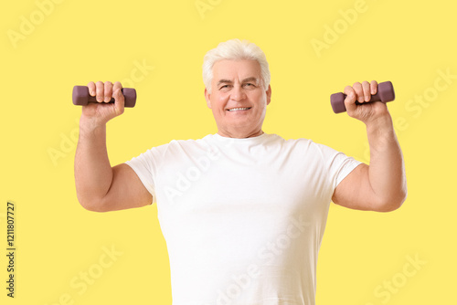 Sporty senior man exercisin...