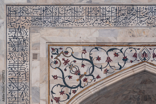 India. Uttar Pradesh state. Agra. Taj Mahal. White marble mausoleum built by the Muslim Mughal emperor Shah Jahan in memory of his wife Mumtaz Mahal. Detail of marble mosaic and calligraphy