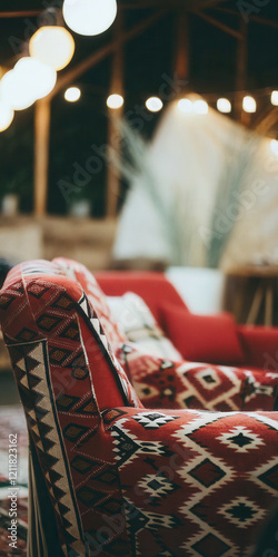 Cozy Rustic Indoor Lounge with Geometric Red Armchair and Ambient Lighting