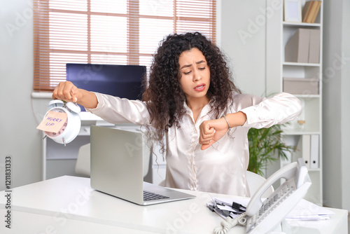 Stressed businesswoman hold...