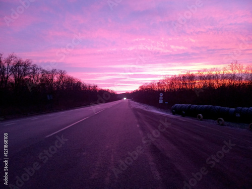 red clouds and road