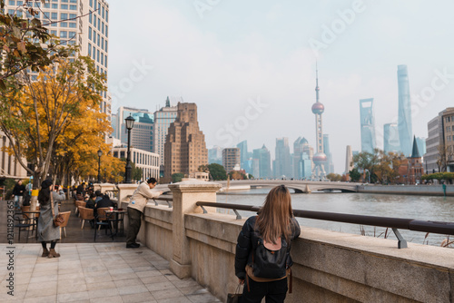 Photography woman traveler visiting in Shanghai, China
