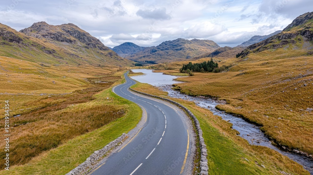 Winding road through scenic valley, lake, mountains; travel, landscape photography Winding road through scenic valley, lake, mountains; travel, landscape photography