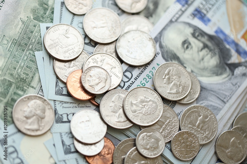Many hundred dollar bills and US cents coins. Different coins and banknotes. Many hundred dollar bills and US cents coins. Different coins and banknotes.