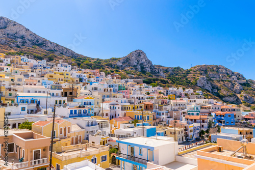 Colorful Menetes village on a hill slope on Karpathos Island, Greece photo