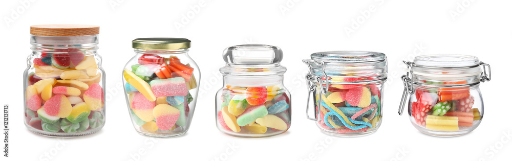 Set of different bright candies in glass jars isolated on white Set of different bright candies in glass jars isolated on white