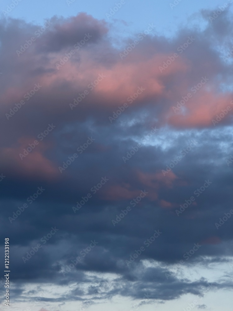 Fototapeta premium dark pink clouds. clouds in the sky. dark clouds in a bright sky. time lapse clouds.