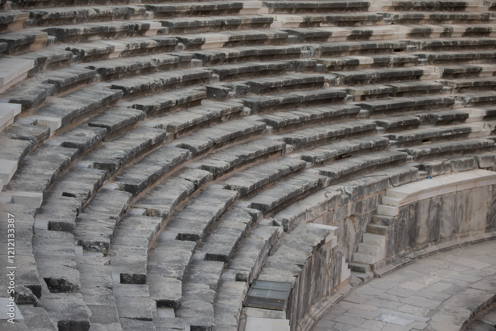 Part of an ancient amphitheater with a stone staircase. Part of an ancient amphitheater with a stone staircase.