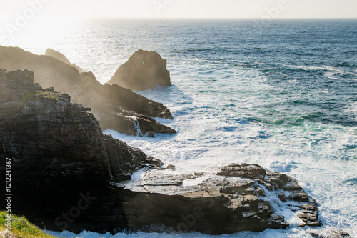 Rough and rocky shore at Malin Head, Ireland's northernmost point, Wild Atlantic Way, spectacular coastal route. Numerous Discovery Points. Co. Donegal photo