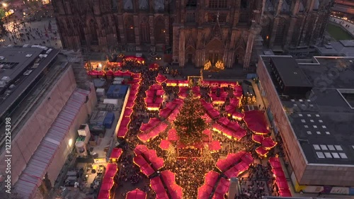 Christmas market near to Cologne Cathedral, evening Weihnachtsmarkt, Koelner Dom in Cologne, Germany, Aerial Winter Shot