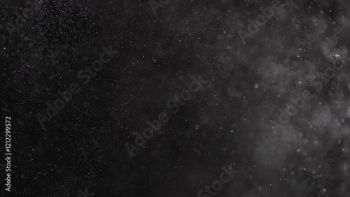 Realistic video of a strong air pressure similar to an explosion filling the video with particles similar to dust, water drops, snowstorm.