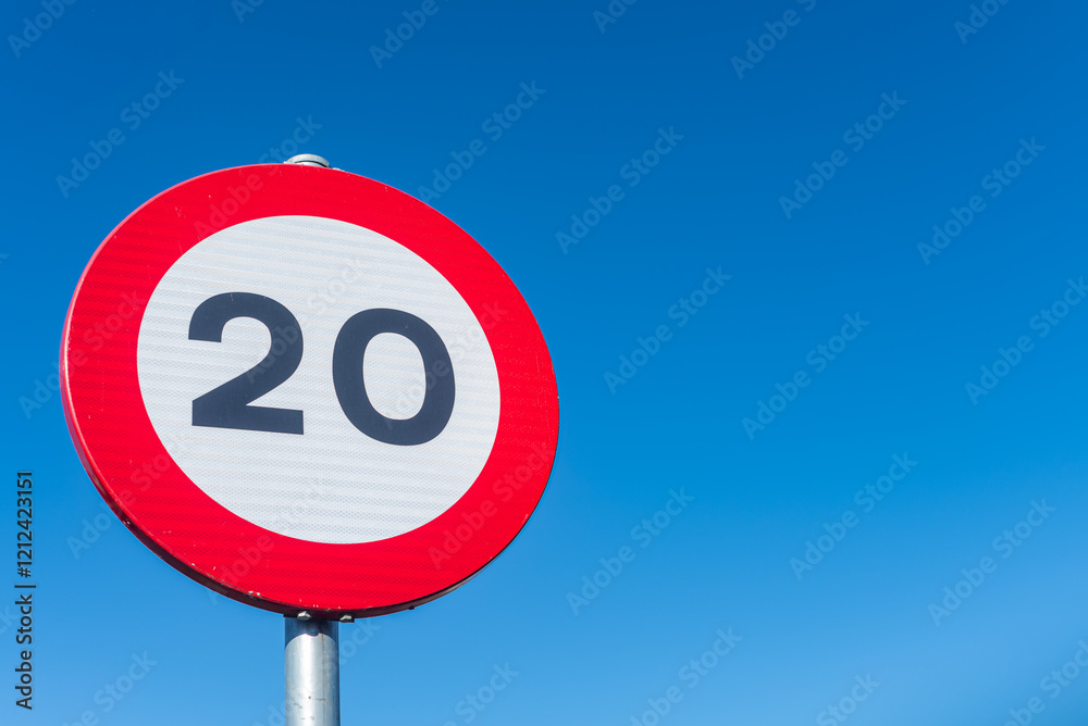 twenty kilometers per hour speed limit sign with blue sky background, background traffic concept twenty kilometers per hour speed limit sign with blue sky background, background traffic concept