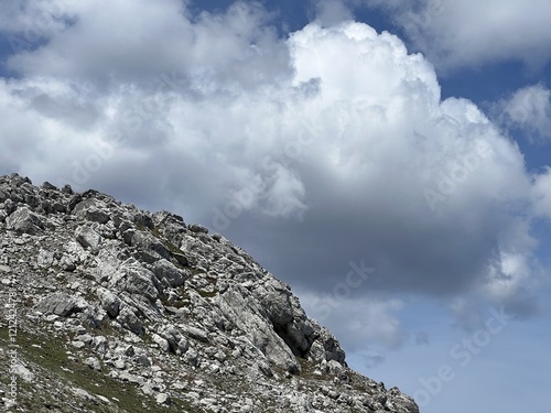 Beautiful picturesque clouds above the Mediterranean mountain range - Velebit Nature Park, Croatia (Prekrasni slikoviti oblaci iznad mediteranskog planinskog masiva - Park prirode Velebit, Hrvatska) photo