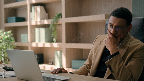 Upset stressed African American man negative emotion fail business project with laptop desperate businessman office worker investor take off glasses work crisis bankruptcy worry failure loss finance