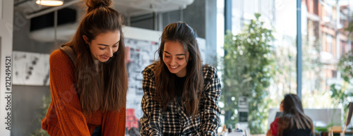 Wallpaper Mural Two business workers in modern office culture, highlights efficiency and cooperative work in a professional environment, ideal for marketing business services or tech solutions. Torontodigital.ca