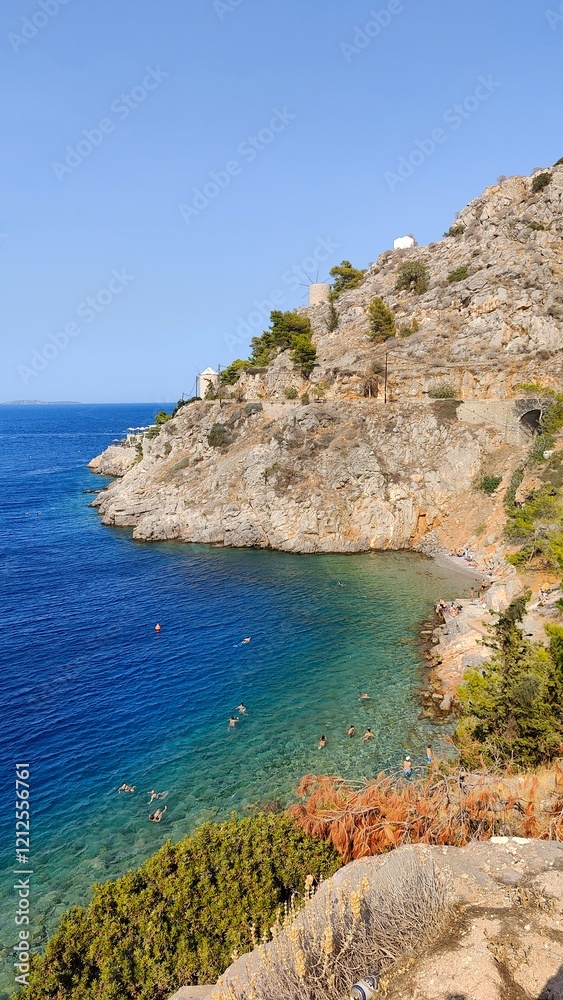 The picturesque greek island of Hydra in the blue Mediterranean Sea, Greece The picturesque greek island of Hydra in the blue Mediterranean Sea, Greece