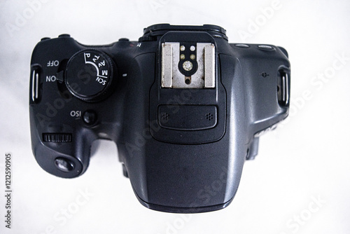Obraz na płótnie Top view of an DSLR, digital single-lens reflex camera on white background