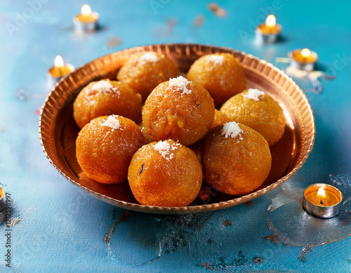 Bundi laddu dessert made during indian festival. It is famous dessert which made in every home during special occasion such as wedding or various festivals. Used selective focus. photo