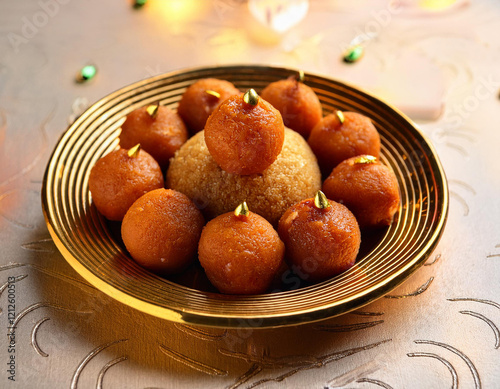 Bundi laddu dessert made during indian festival. It is famous dessert which made in every home during special occasion such as wedding or various festivals. Used selective focus. photo