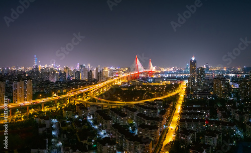 Aerial view of YangPu Bridge at night in Shanghai photo