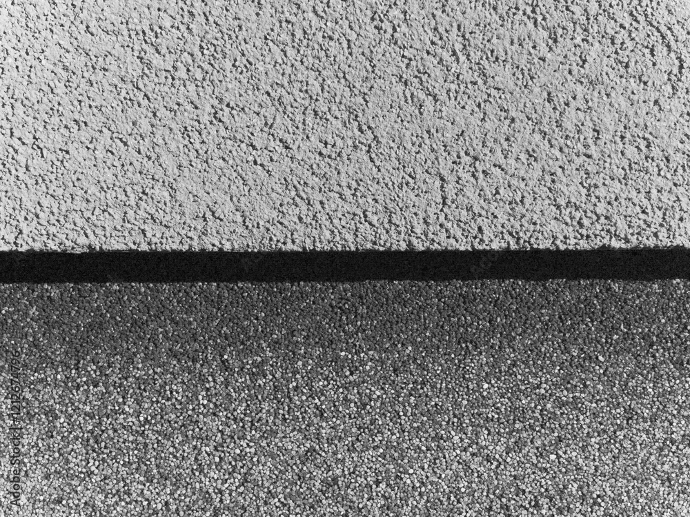 Fototapeta premium A wall with a black line on it