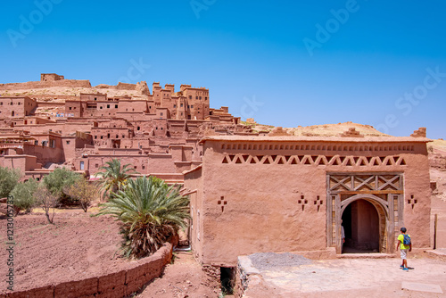 Traditional Moroccan architecture in Ait Benhaddou Kasbah, a UNESCO World Heritage site in Ouarzazate, radiates under the summer sun, highlighting its rich history and unique beauty