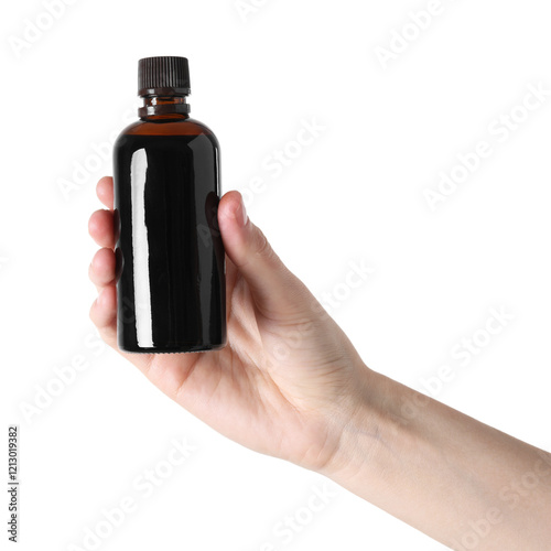 Woman with bottle of topical iodine on white background, closeup