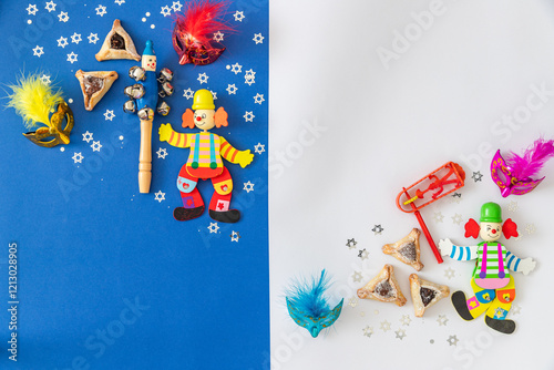 Purim celebration concept (jewish carnival holiday).Hamantaschen cookies and masks	 photo