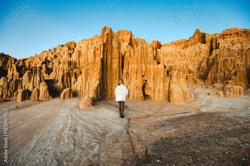 A woman is walking through the scenic views of Cathedral Gorge State Park in Lincoln County, Nevada photo