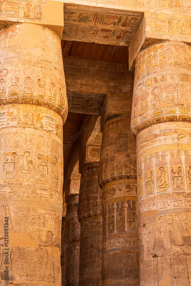 Detail of the carvings on the numerous stone columns supporting roof of Karnak Temple near Luxor