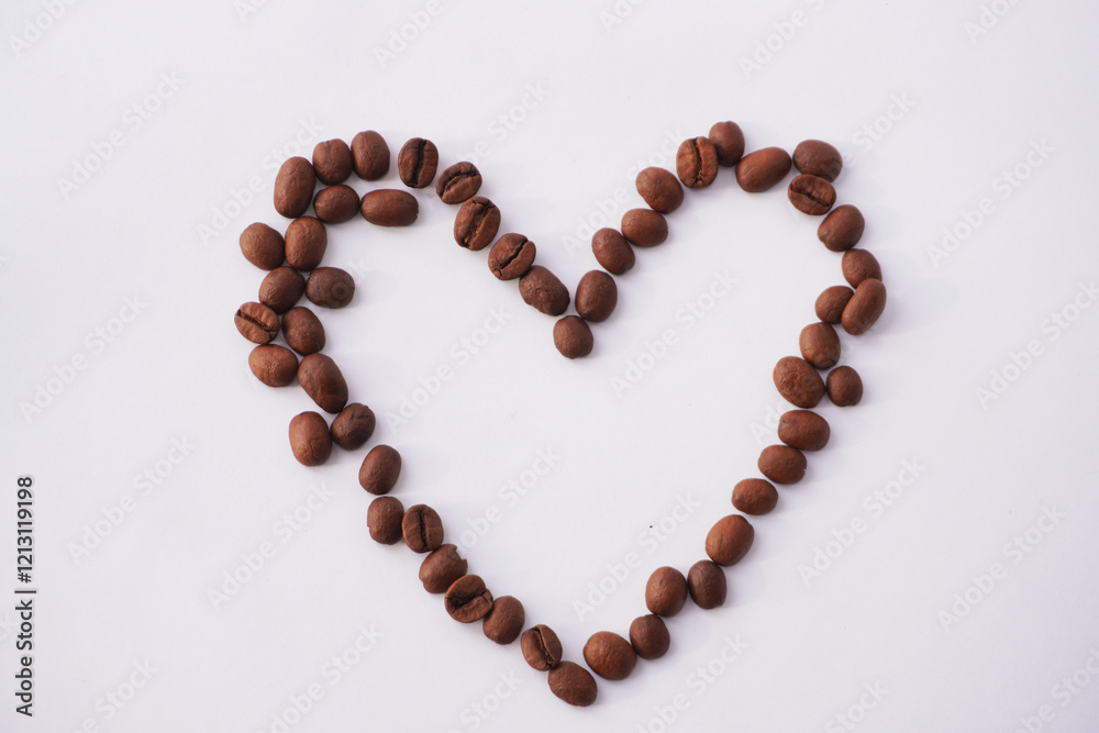A heart shape carefully arranged with roasted coffee beans on a white background, creating a minimalist and artistic composition that symbolizes love, warmth, and appreciation for coffee. A heart shape carefully arranged with roasted coffee beans on a white background, creating a minimalist and artistic composition that symbolizes love, warmth, and appreciation for coffee.
