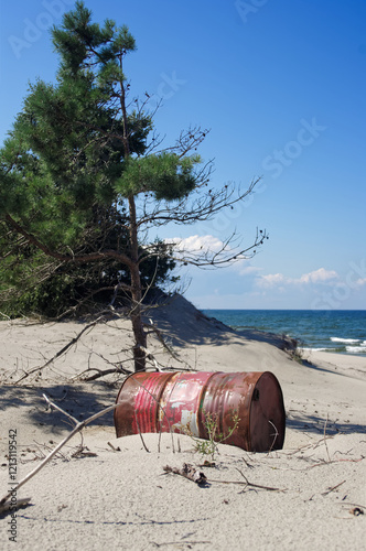 Wild sea lanscape polluted by a plastic garbage. Photoproject against pollution photo