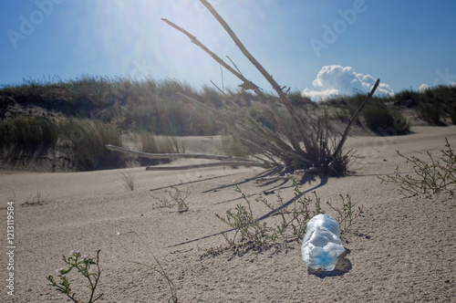 Wild sea lanscape polluted by a plastic garbage. Photoproject against pollution photo