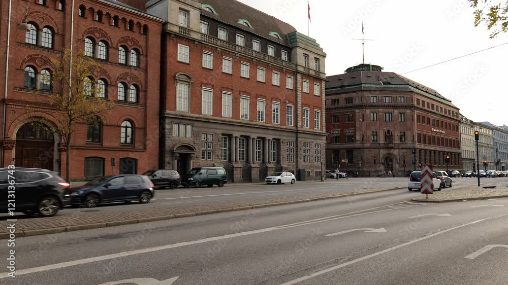 View across the road to beautiful Scandinavian houses in the capital of Denmark. Old red brick buildings. Copenhagen View across the road to beautiful Scandinavian houses in the capital of Denmark. Old red brick buildings. Copenhagen