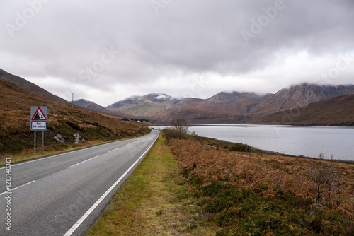 landscape with lake and mountains on the road 