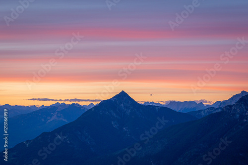A sunset view of the mountain peaks taken from Mountain Seven on the outskirts of Golden in British Columbia