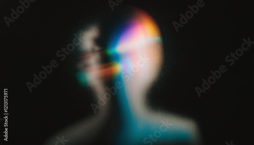 Iridescent blurred grainy silhouette on black background