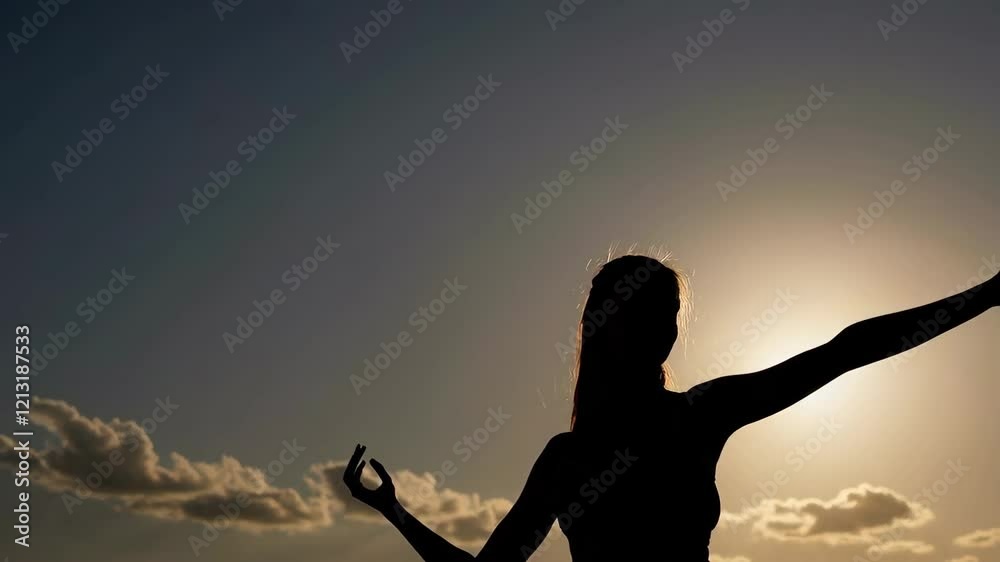 Silhouette of Woman Against Sunset Shot Capturing Freedom and Emotions Silhouette of Woman Against Sunset Shot Capturing Freedom and Emotions
